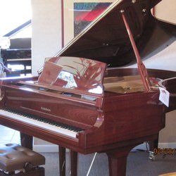 Clinton's Music House - New Baldwin Grand Pianos