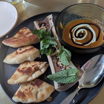 Siti - "roti" (except it's naan) canai with bone marrow - Asian Fusion Near Me - Austin, Texas Siti - "roti" (except it's naan) canai with bone marrow - Asian Fusion Near Me - Austin, Texas