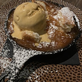 NOMO Kitchen - Peach cobbler for dessert! - New American Near Me - New York, New York