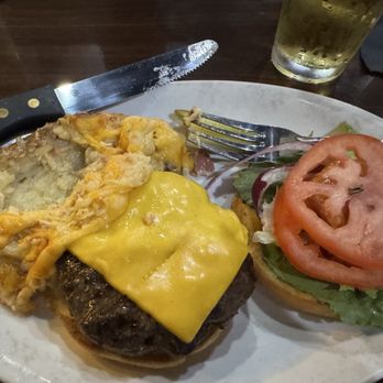 Ribeyes Steakhouse - Cheeseburger with a twice baked potato that was mostly empty. - Steakhouses Near Me - Washington, North Carolina