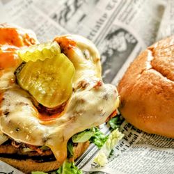 Station 51 Truck Company Bar and Grill - The Buffalo Sandwich: Grilled or fried chicken tossed in house made Buffalo, topped with shredded lettuce and smoked Gouda, on Brioche bun.