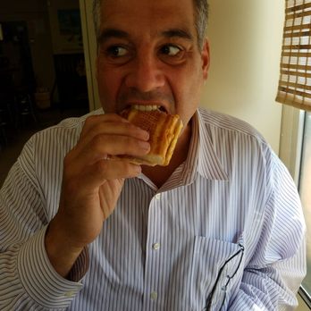 Cuban Sandwich King - My husband eating his first Cuban sandwich...ever! - Cuban Near Me - Lyndhurst, New Jersey Cuban Sandwich King - My husband eating his first Cuban sandwich...ever! - Cuban Near Me - Lyndhurst, New Jersey