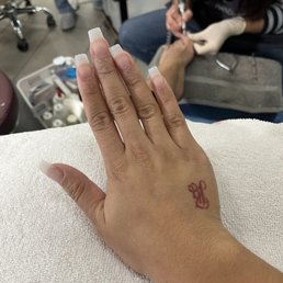 Pre nails before acrylic, Tammy did a good job. So simple and thin. Same with Cindy, very soft with my toes.