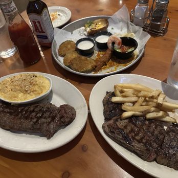 Black Angus Steakhouse - New York Strip & Ribeye w/ au gratin potatoes & fries (Campfire Feast Dinner For 2) - Steakhouses Near Me - Burbank, California Black Angus Steakhouse - New York Strip & Ribeye w/ au gratin potatoes & fries (Campfire Feast Dinner For 2) - Steakhouses Near Me - Burbank, California
