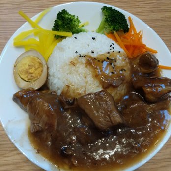 Dumpling & Noodle - Pork rice. The pork was very tender and has a nice flavor. - Noodles Near Me - Bellevue, Washington