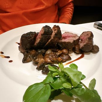 The Capital Grille - Sliced Filet Mignon with Cipollini Onions, Wild Mushrooms and Fig Essence - Steakhouses Near Me - Skokie, Illinois