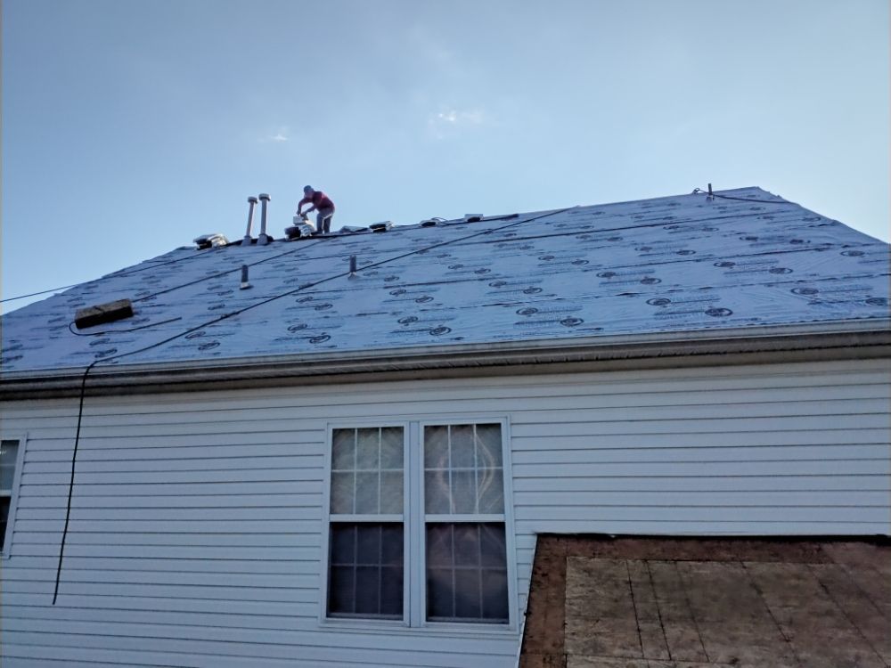 Slide of Two Son Roofing