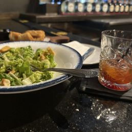 The catfish, Ceasar salad and a makers old fashioned