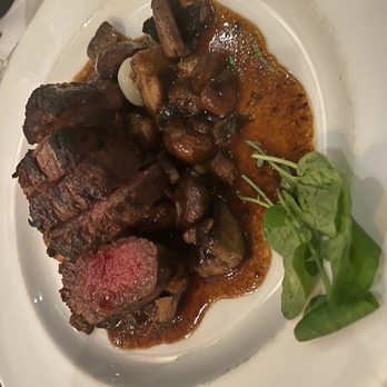 The Capital Grille - Sliced Filet Mignon with Cipollini Onions, Wild Mushrooms and Fig Essence - Steakhouses Near Me - Naples, Florida