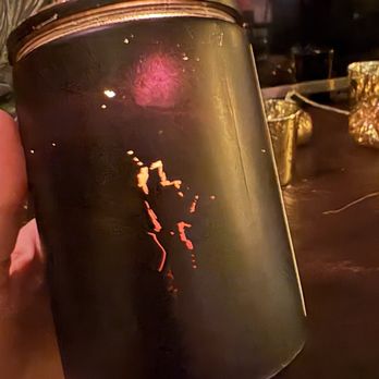 Carpe Noctem Candle - This is the candle once lit, for the first time. Cheaply made! Couldn't see it in the dark store. Not black glass. - Candle Stores Near Me - Stillwater, Minnesota