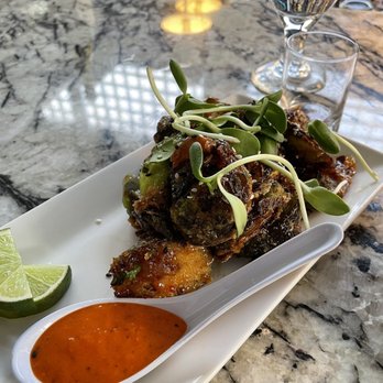 Carruthers - Brussel sprouts with a sweet chili lime sauce with cashews and candied ginger - New American Near Me - Astoria, Oregon