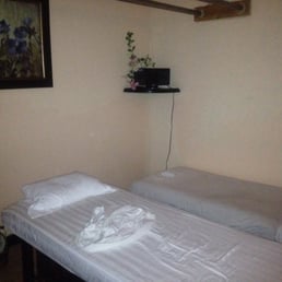 There's another bed behind me that you can't see. This was after my massage, and I wax the only one in there. Good-sized room. There's another bed behind me that you can't see. This was after my massage, and I wax the only one in there. Good-sized room.