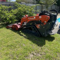 Outpost Rentals - Tiller with front bucket attachment