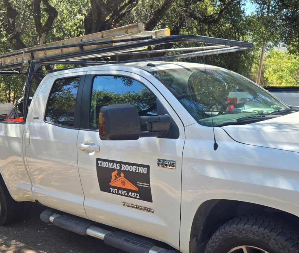 Slide of Thomas Roofing