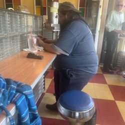 Blue Ribbon BBQ - Cashier and his craft.