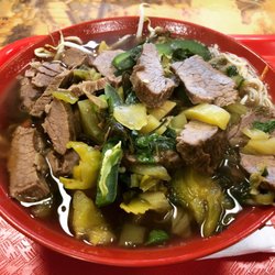 Panda - Beef noodle soup with pickled cabbage.
