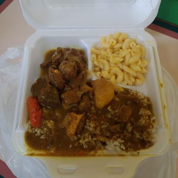 Higher Heights Caribbean Restaurant - Curried goat over white rice, macaroni & cheese - Caribbean Near Me - Norfolk, Virginia Higher Heights Caribbean Restaurant - Curried goat over white rice, macaroni & cheese - Caribbean Near Me - Norfolk, Virginia