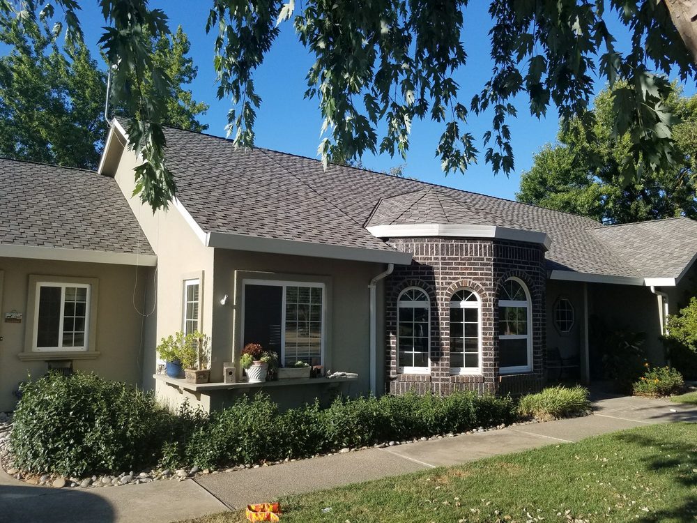 Slide of Green's Roofing