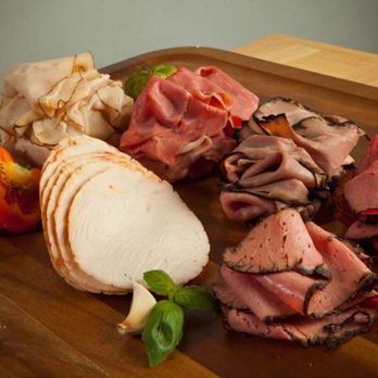 Almasry Grocery - a cutting board with meat and vegetables - Grocery Near Me - Selden, New York Almasry Grocery - a cutting board with meat and vegetables - Grocery Near Me - Selden, New York