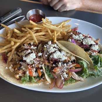 Cazzy's Corner Grill - "Steak" tacos with chicken subbed in since they ran out. Still quite tasty. cheese crumbles on this were just perfect - not too salty. - American Near Me - Knoxville, Tennessee