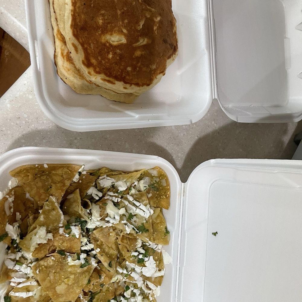 My Garage Kitchen - Chilaquiles with eggs missing and 2 pancakes side - New American Near Me - North Las Vegas, Nevada