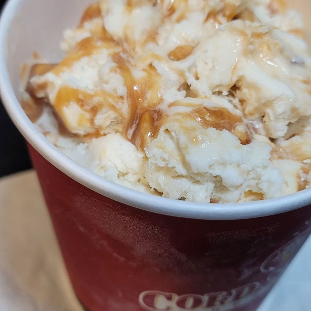 a cup of ice cream and caramel
