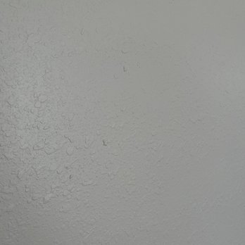 Ramirez & Hijos Painting - Terrible texture / wall damage that was not repaired by Mr. Ramirez after we PAID HIM THOUSANDS to do the job. - Painters Near Me - Tucson, Arizona