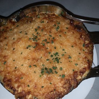 Maple & Ash - Bubbling Potato Gratin - Steakhouses Near Me - Chicago, Illinois Maple & Ash - Bubbling Potato Gratin - Steakhouses Near Me - Chicago, Illinois