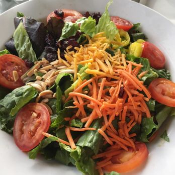 Chestnut Hill Restaurant - Dinner Entree Salad (iceberg, romaine, spring lettuce, almonds, tomatoes, cheese, craisens) - forgot egg, added carrots and jalapeños - New American Near Me - Myrtle Beach, South Carolina