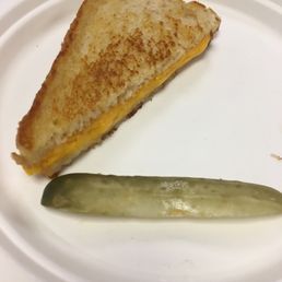 Half of my Grilled cheese on sourdough $2.85. Amazing Half of my Grilled cheese on sourdough $2.85. Amazing