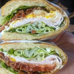 Le Croissant Cafe - Turkey bacon with a fried egg on a croissant =DELICIOUS
