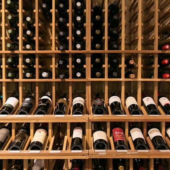 Westside Wine & Spirits - a wine rack full of wine bottles - Beer, Wine & Spirits Near Me - Wilson, Wyoming