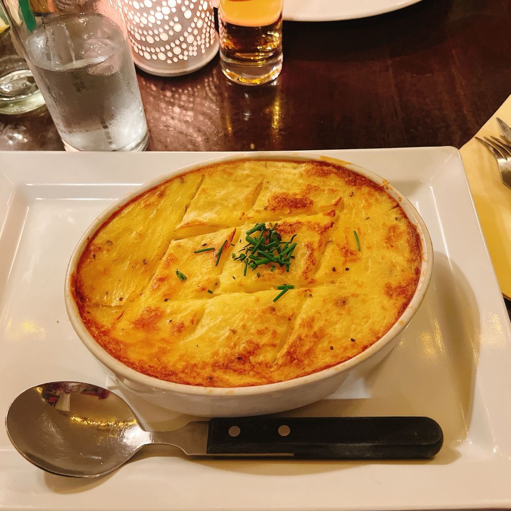 The Pantry - Oven dish with cauliflower, ground beef, Old Amsterdam cheese, curry onions and mashed potatoes - Modern European Near Me - Amsterdam, New Hampshire The Pantry - Oven dish with cauliflower, ground beef, Old Amsterdam cheese, curry onions and mashed potatoes - Modern European Near Me - Amsterdam, New Hampshire