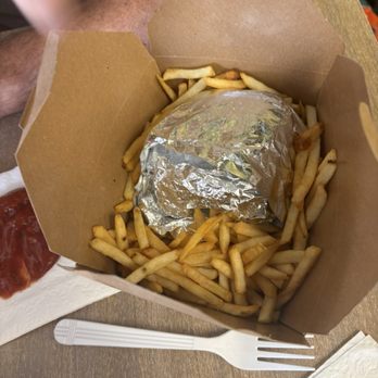 Sunshine Vegan Eats - To-go box of fries and buffalo chicken sandwich.  I should have taken a photo of the sandwich outside its foil wrapping.  It was perfection! - Vegan Near Me - Buffalo, New York