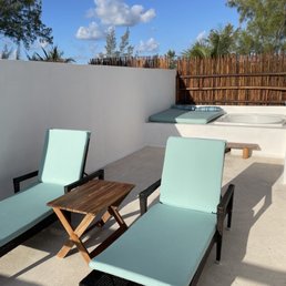 Rooftop private tub and loungers. Rooftop private tub and loungers.