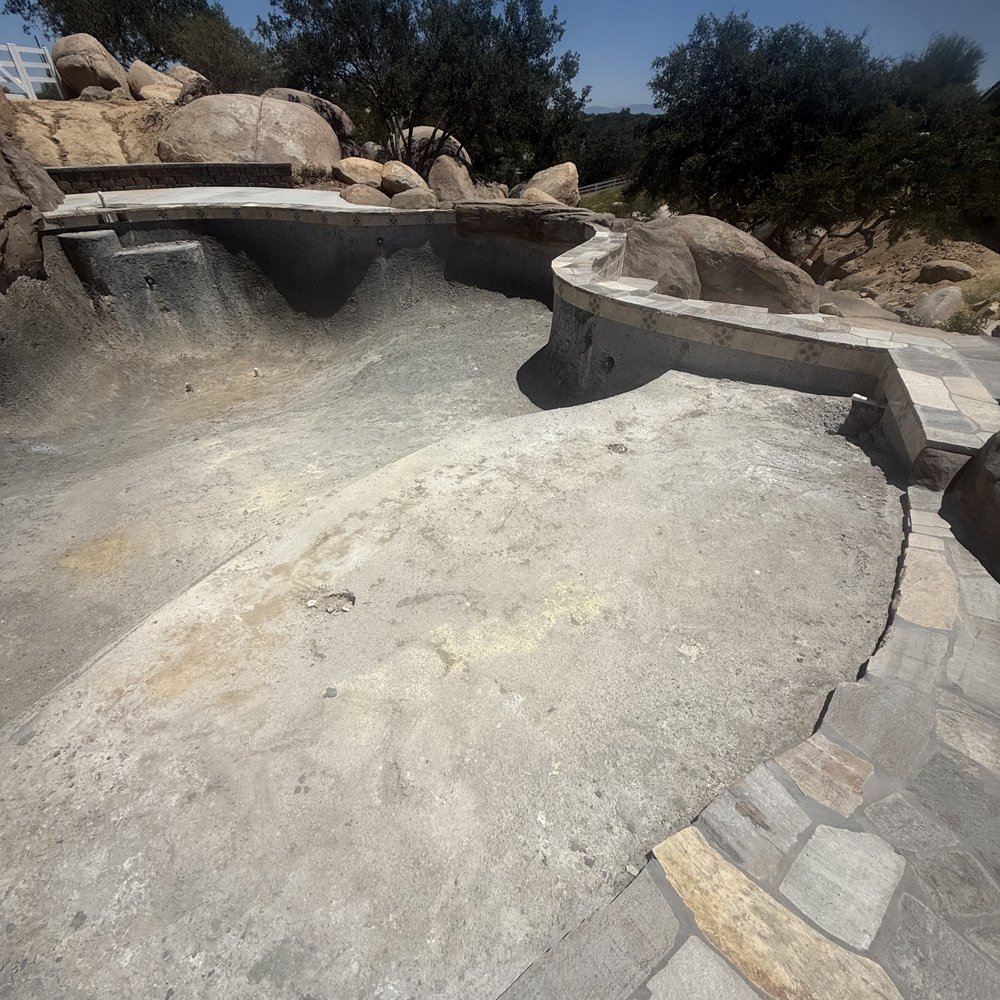Premier Pools & Spas - Temecula, CA - Unfinished Pool with designed with ADA features and Beach Entrance for our special needs children construction over 574 days - Pool & Hot Tub Service Near Me - Murrieta, California