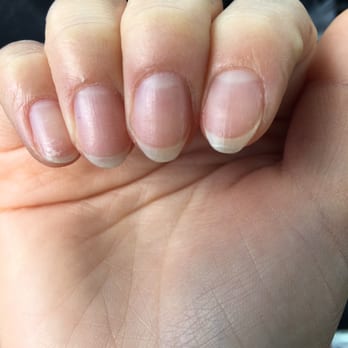 Tips & Toes - Not sure what kind of round this is. Walked out before she could continue filing and leave me with nothing but skin. - Nail Salons Near Me - Westminster, California