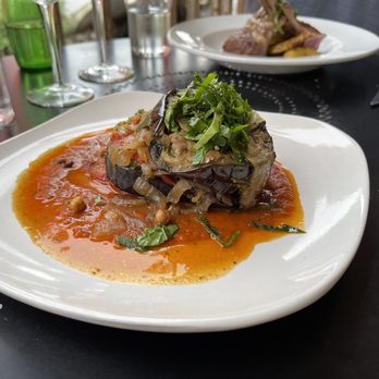 The Left Bank Cafe - a plate of food on a table - French Near Me - Saranac Lake, New York