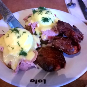 Lola - Egg Benedict. The portion is Kind of large for me - Greek Near Me - Seattle, Washington