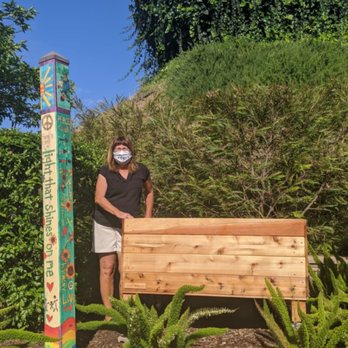 Victory Garden LA - My mom with her new planter box! There's definitely a smile under that mask. - Nurseries & Gardening Near Me - Los Angeles, California Victory Garden LA - My mom with her new planter box! There's definitely a smile under that mask. - Nurseries & Gardening Near Me - Los Angeles, California