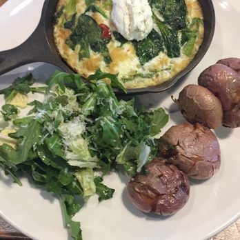 The Rec Room - White egg frittata with spinach and roasted tomatoes with a side of roasted potatoes - Canadian (New) Near Me - Calgary, Alberta The Rec Room - White egg frittata with spinach and roasted tomatoes with a side of roasted potatoes - Canadian (New) Near Me - Calgary, Alberta