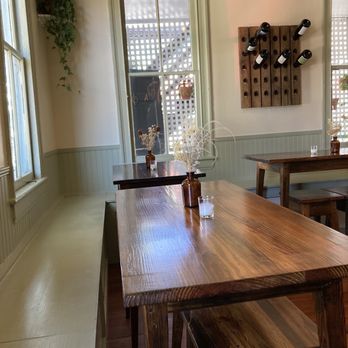 The Tippling House - a table and chairs in a room - Wine Bars Near Me - Charleston, South Carolina The Tippling House - a table and chairs in a room - Wine Bars Near Me - Charleston, South Carolina