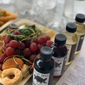 Great Frogs - a tray of grapes, cheese, crackers, and a bottle of wine - Wineries Near Me - Annapolis, Maryland