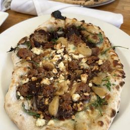 lunch sized pizza with arugula, pancetta, roasted garlic, fig jam, & more! lunch sized pizza with arugula, pancetta, roasted garlic, fig jam, & more!