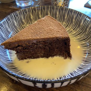 Conmole - Tres leches chocolate cake. - Mexican Near Me - Charlottesville, Virginia Conmole - Tres leches chocolate cake. - Mexican Near Me - Charlottesville, Virginia