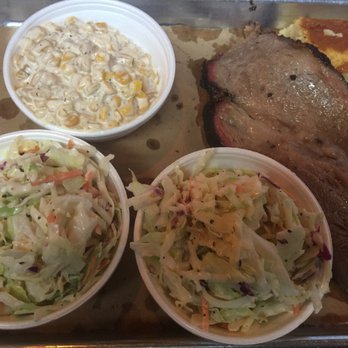 Meat BBQ - My brisket (nice thick cut) with the cream corn and two sides of slaw (one for my mom). Neither of us was impressed with the slaw. - Barbeque Near Me - Lansing, Michigan