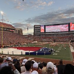 Darrell K Royal-Texas Memorial Stadium - TX flag with TX "T" at the other end. Seats 100,119 people officially.