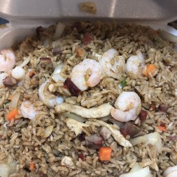 shrimp and rice in a styrofoam container shrimp and rice in a styrofoam container