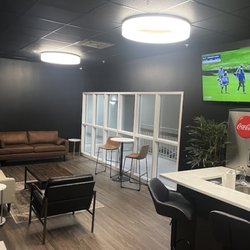 Birdie's Golf Lounge - The bar and lounge area and one of many TVs in the place. Would be an awesome hang out to watch sporting events.