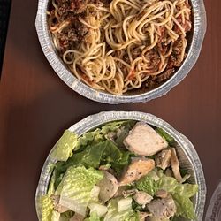Little Italy - Bland spaghetti w/meat sauce.  I couldn't eat it! Chicken ceasar salad...no Parmesan  smh. DEFINITELY not worth it